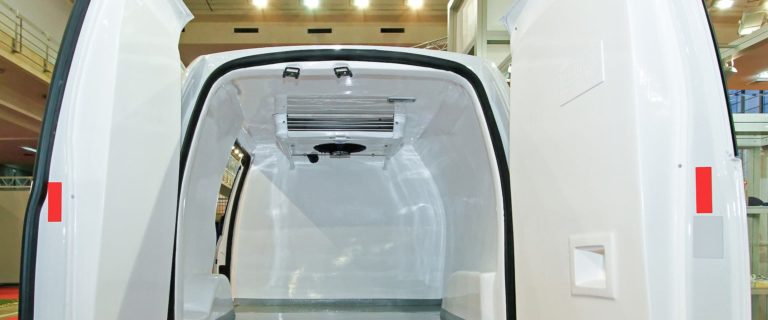 Open rear doors of white van
